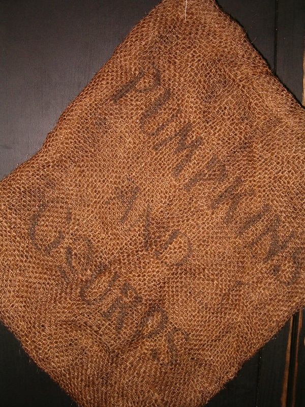 small pumpkins and gourds burlap sack