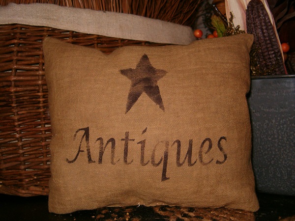 small antiques pillow with star