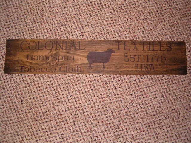 colonial textiles sign