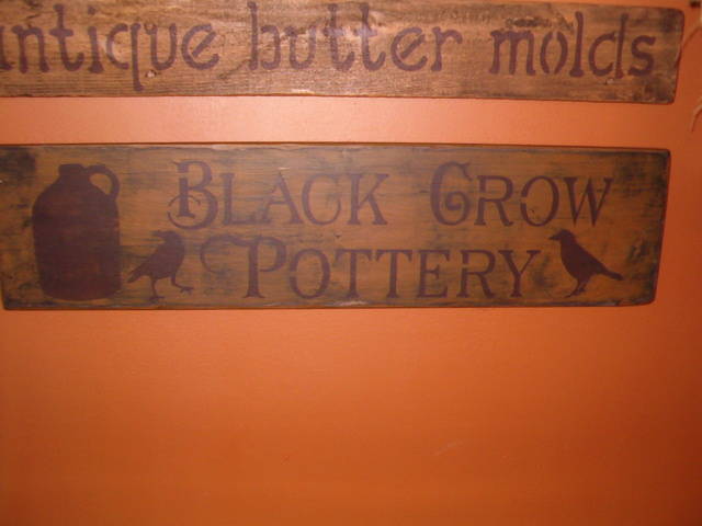 black crow pottery sign