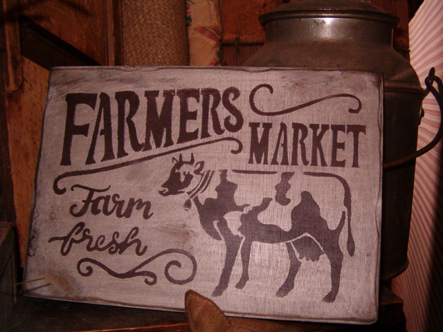 Farmer's Market cow sign