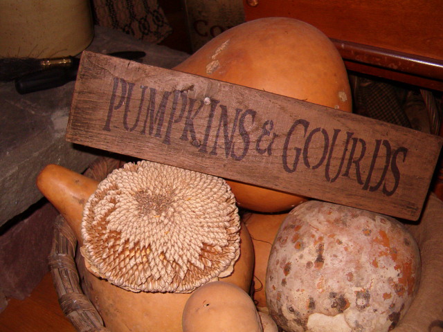 small pumpkins and gourds sign