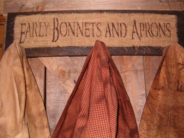 Early Bonnets and Aprons peg rack