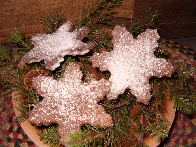 Frosted gingerbread snowflake cookies
