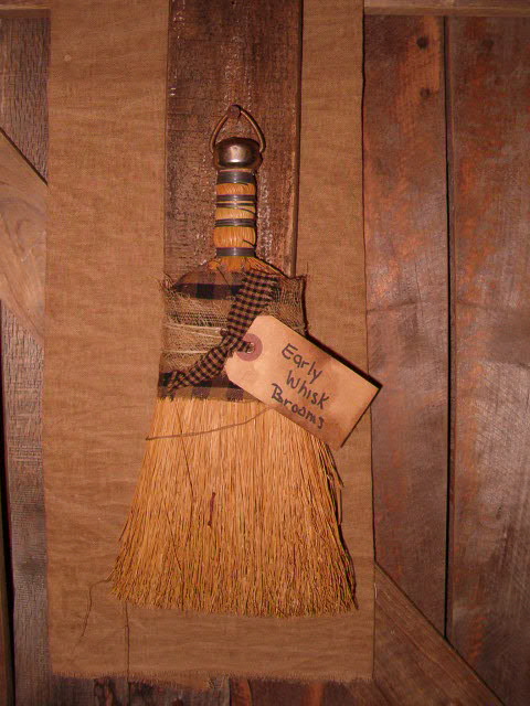 Early whisk brooms hanger
