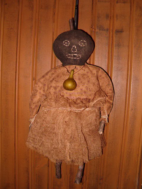 Olive pumpkin doll