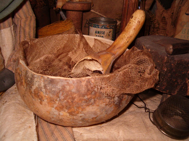 Gourd bowl with drieds and gourd spoon
