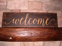 cursive welcome sign