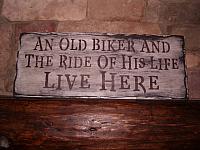 An old biker sign