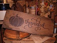 Thankful sign with pumpkin