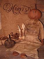 Mrs. Hatchet pumpkin doll