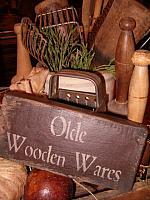 Olde wooden wares shelf sitter