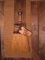Early whisk brooms hanger